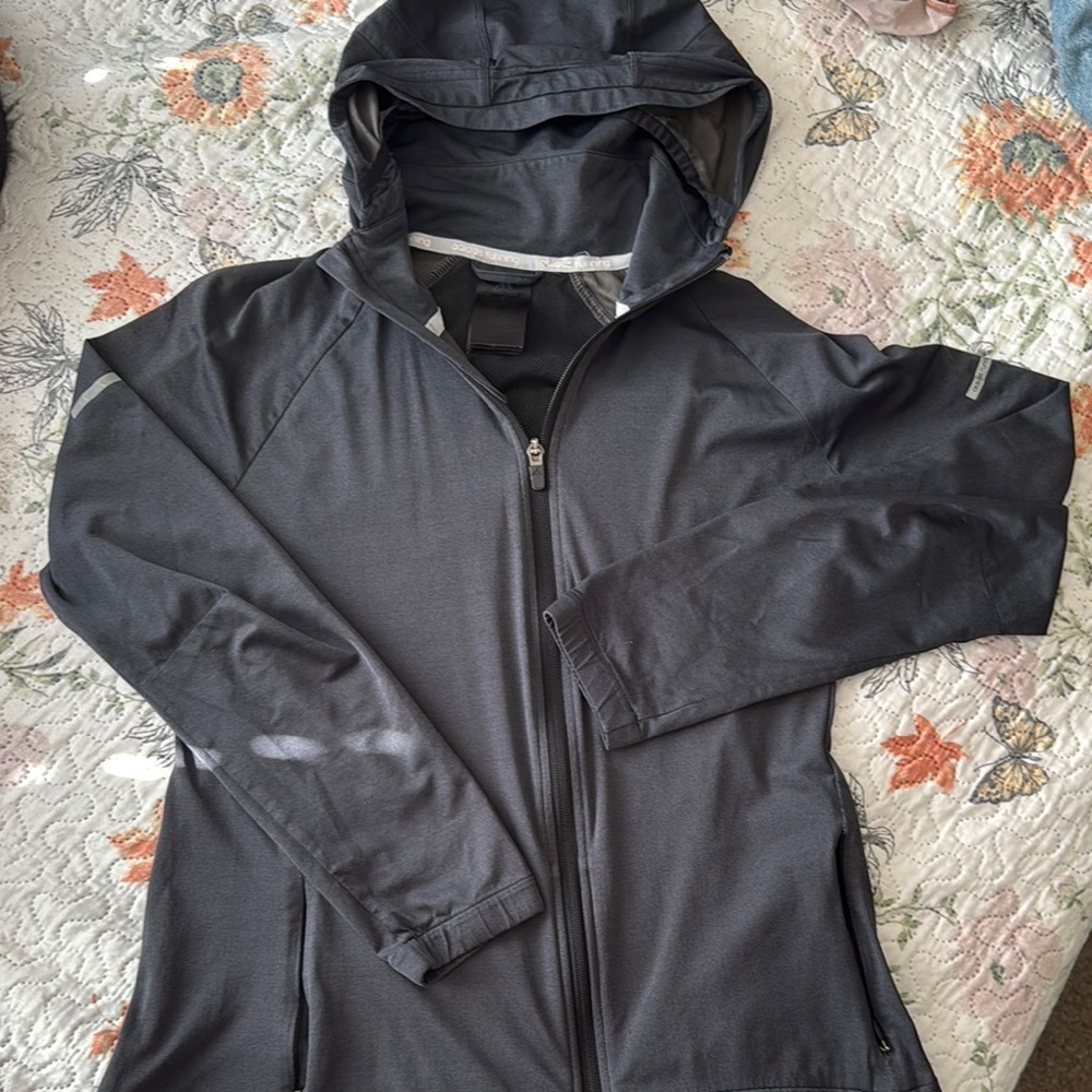Adidas Black Windbreaker with Hooded Design and Sporty Silhouette